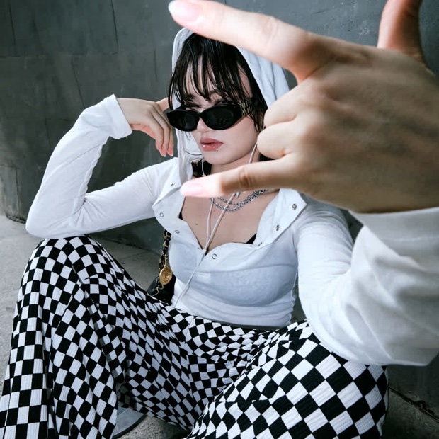Original photograph with a fine black-and-white checked pattern
